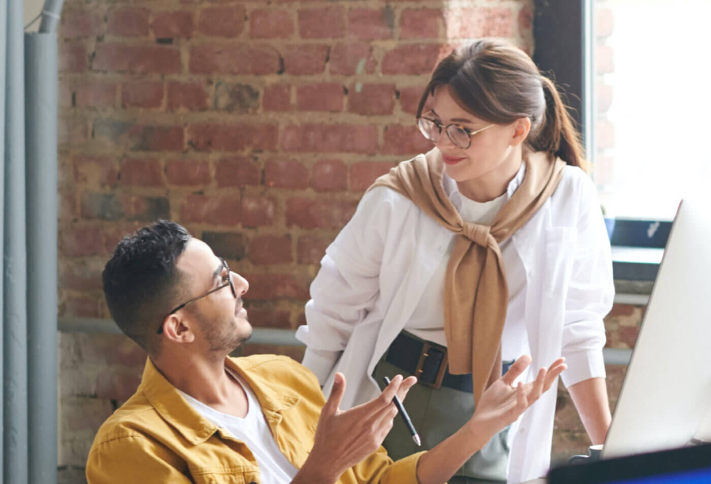 Two employees talking