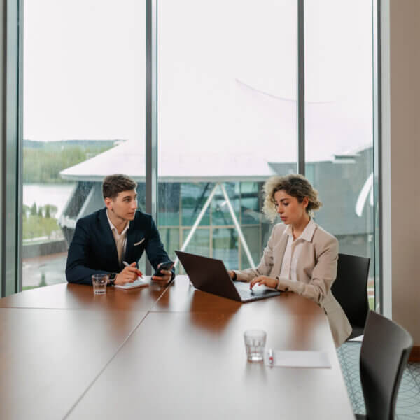 Atlanta office - two people meeting together at a meeting table